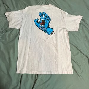 Santa Cruz, pink shirt, blue hand